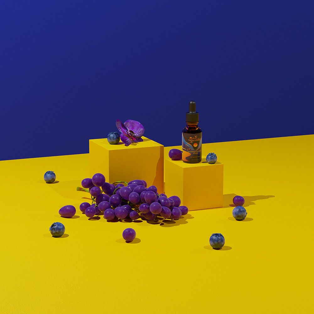 Snoozley GoodNight’s Dream Potion bottle on yellow podiums with grapes, blueberries and an orchid against deep blue