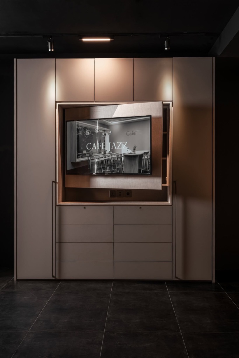 Woodex Cafe Jazz media cabinet with a built-in screen and drawer storage